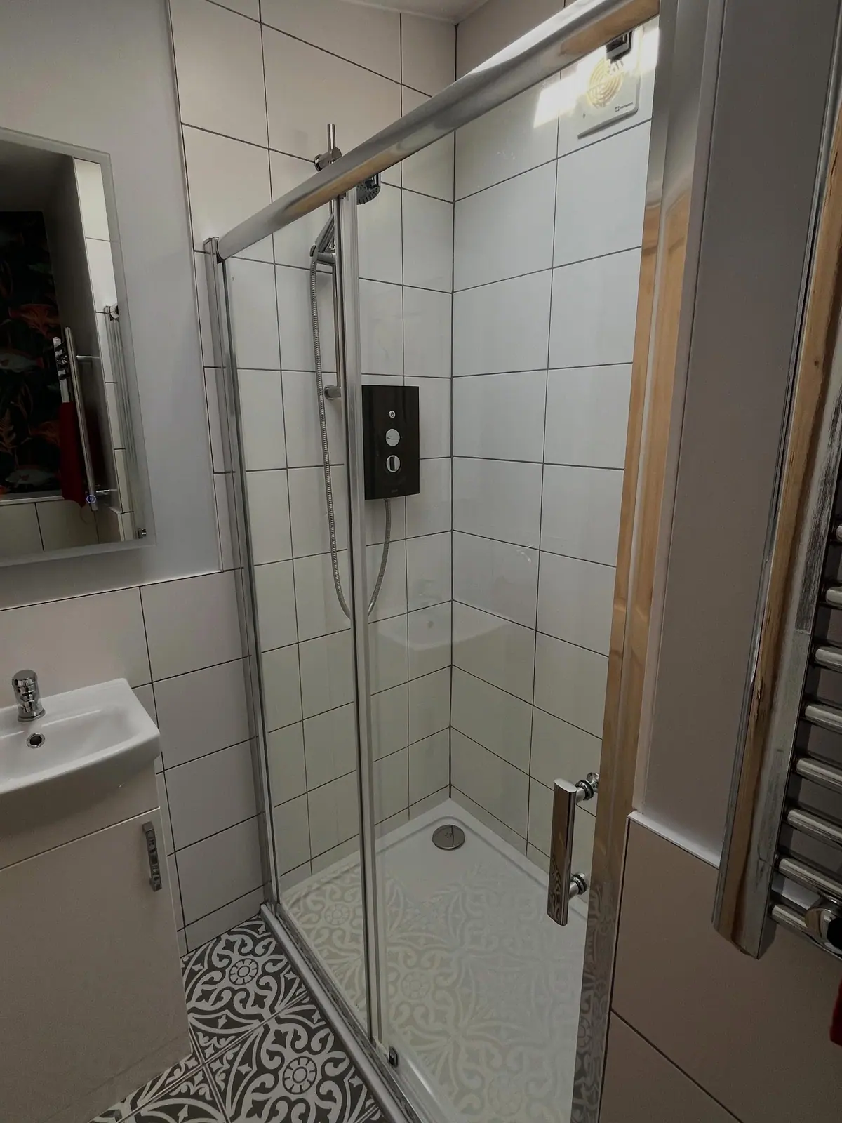 Shower room with glass shower enclosure