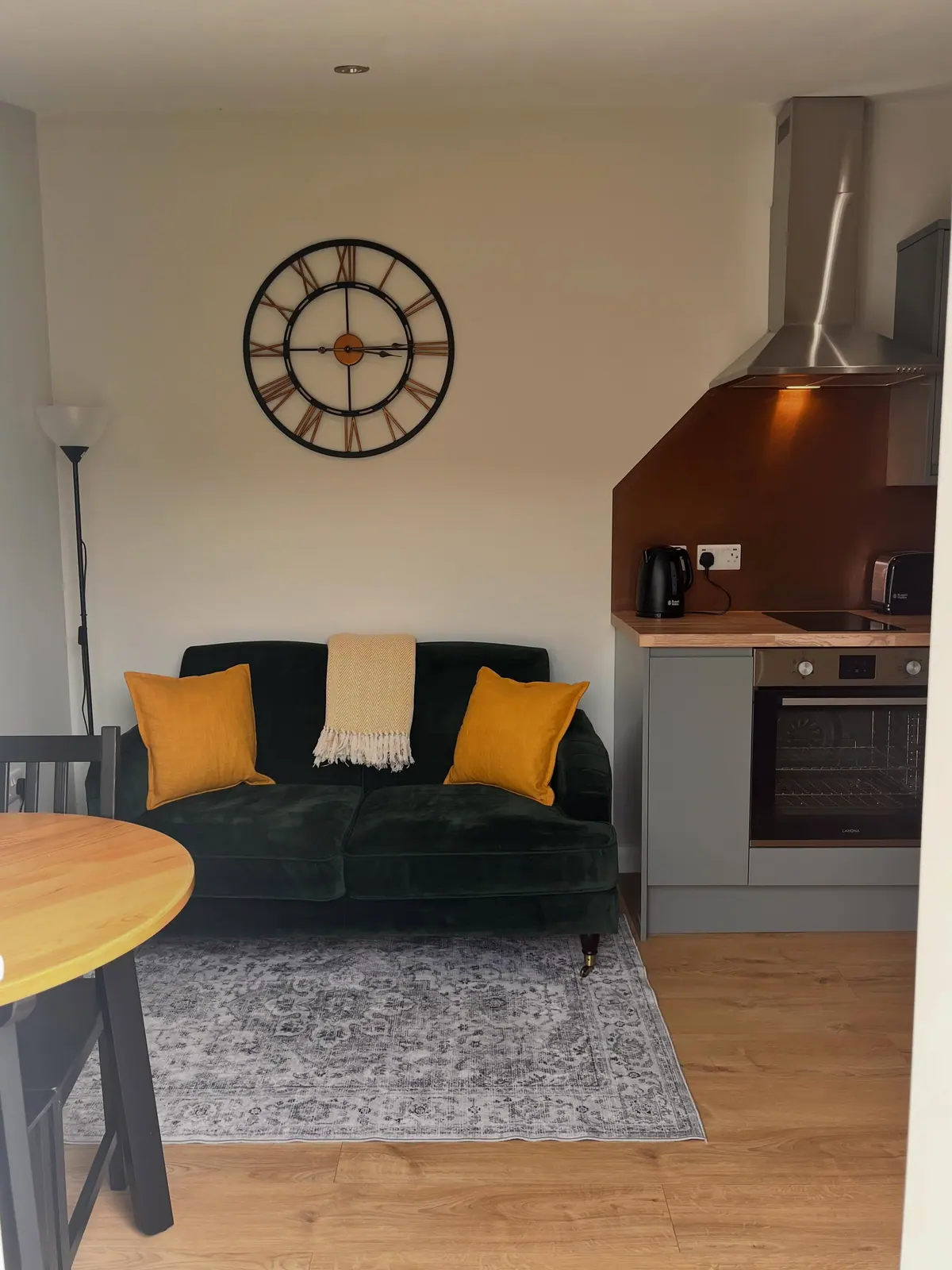 Sofa and dining area beside the kitchen
